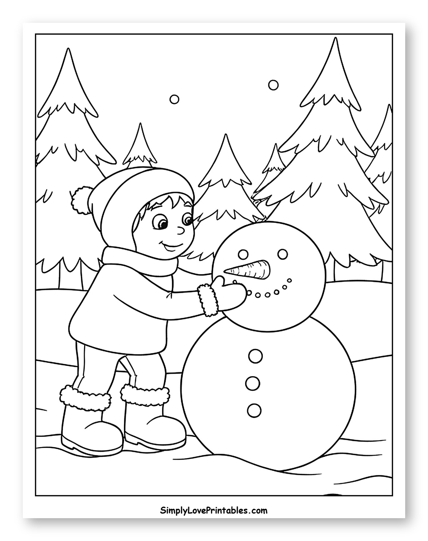 Boy in Winter Clothes Building a Snowman