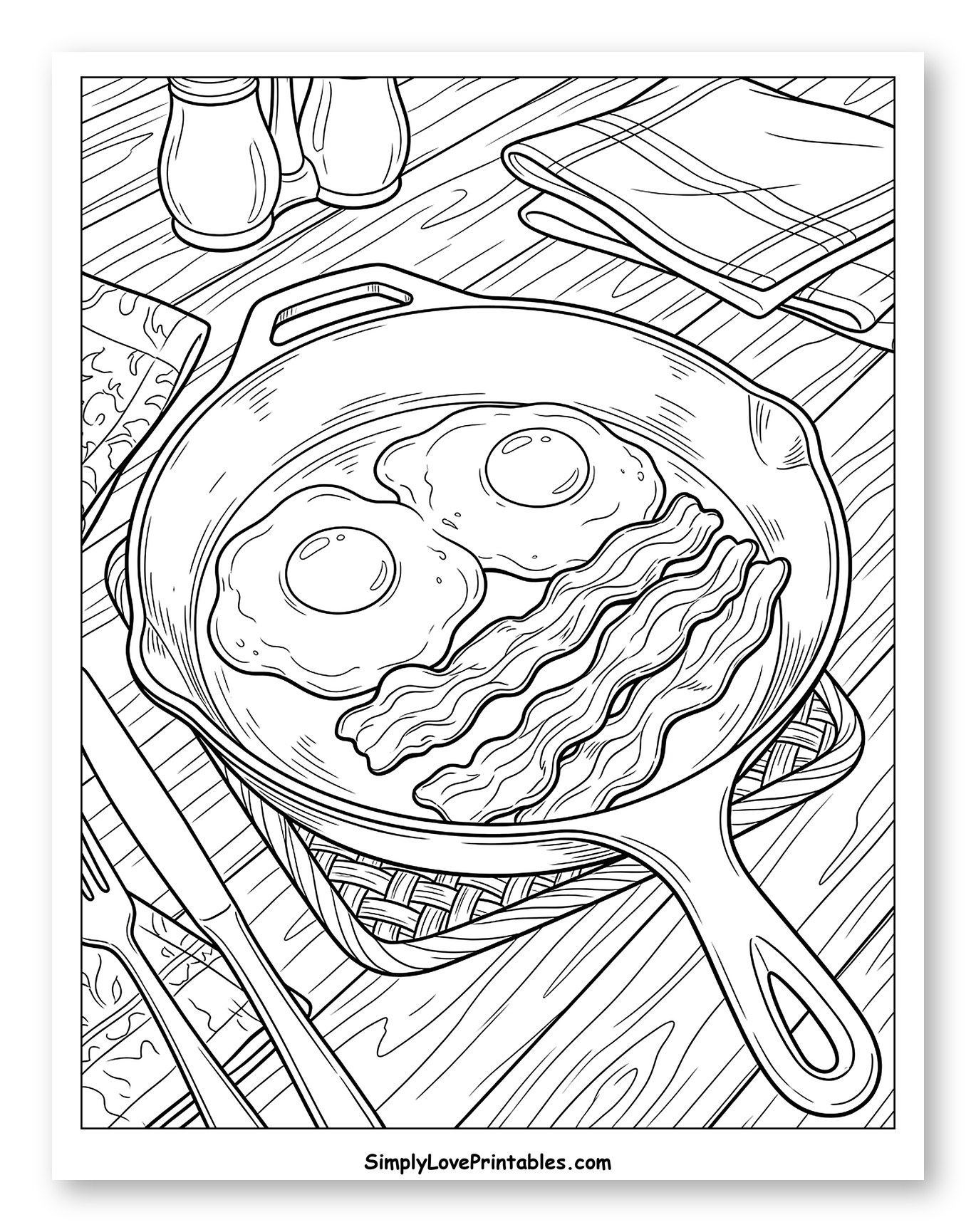 Fried Eggs and Crispy Bacon in Skillet