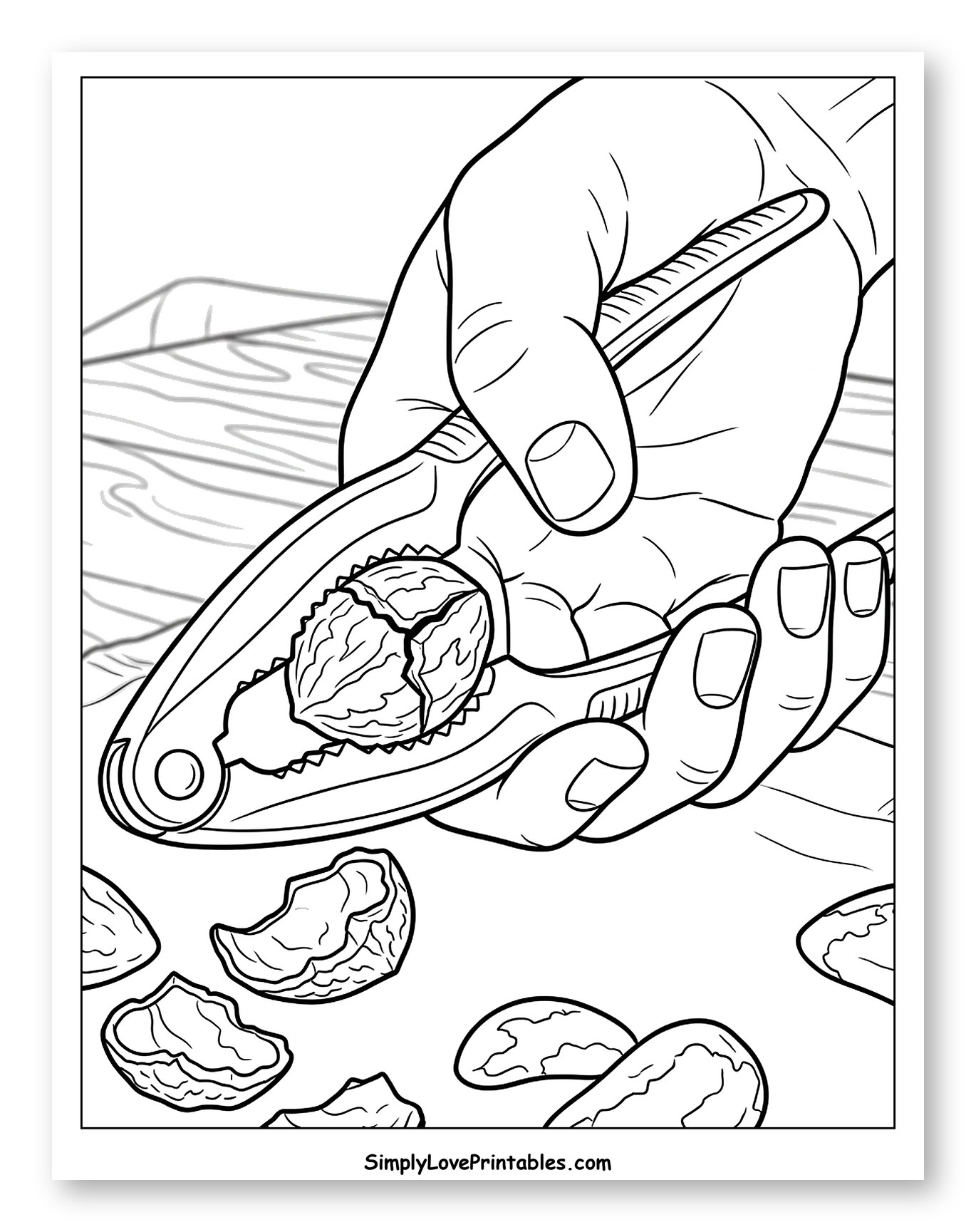 Hand Cracking a Walnut with a Nutcracker