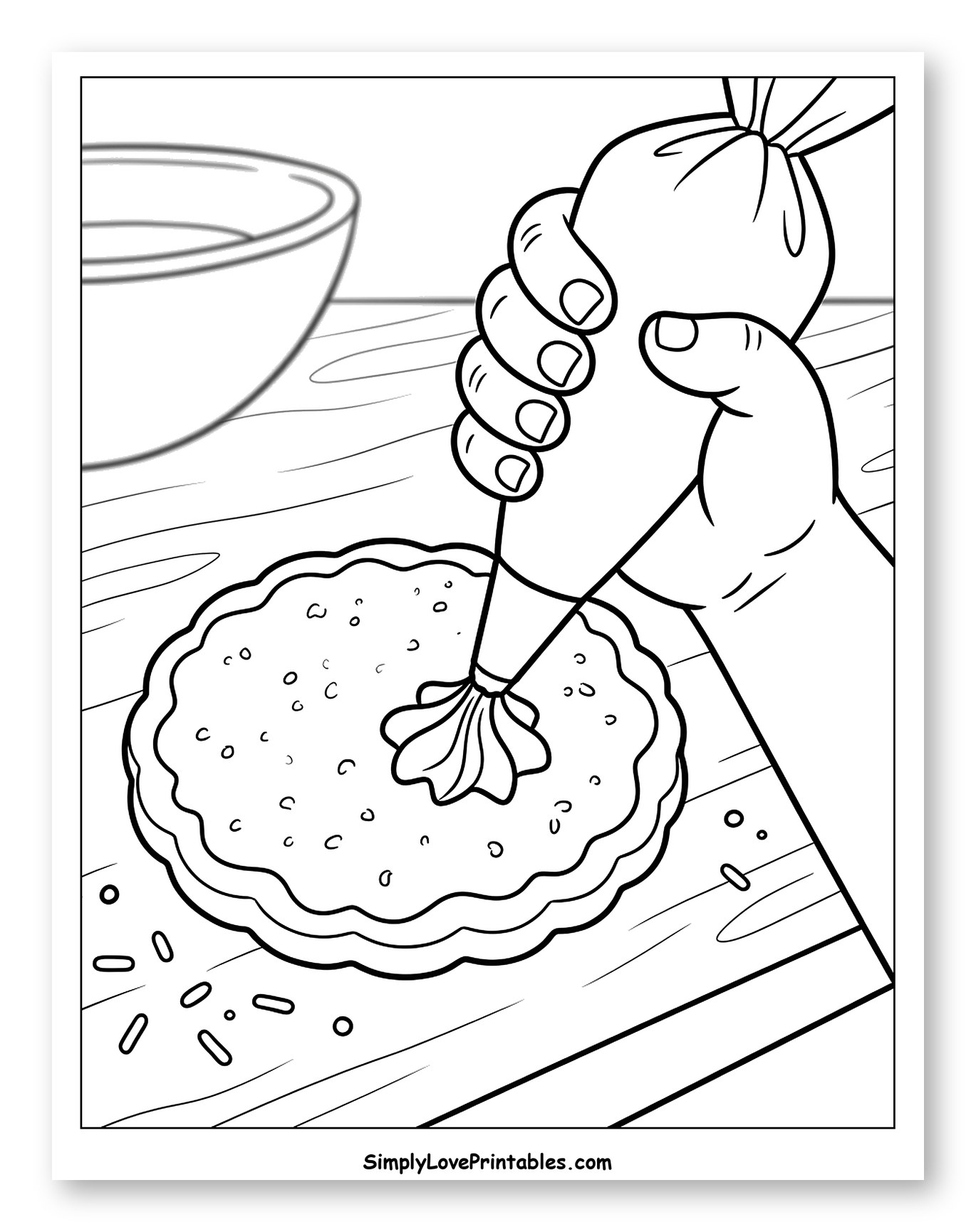 Hand Decorating a Cookie with Frosting to Color for Kids