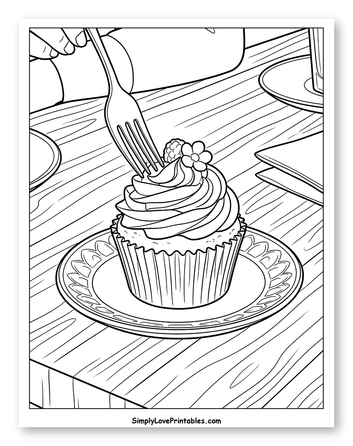 Hand Eating a Cupcake at a Wooden Table