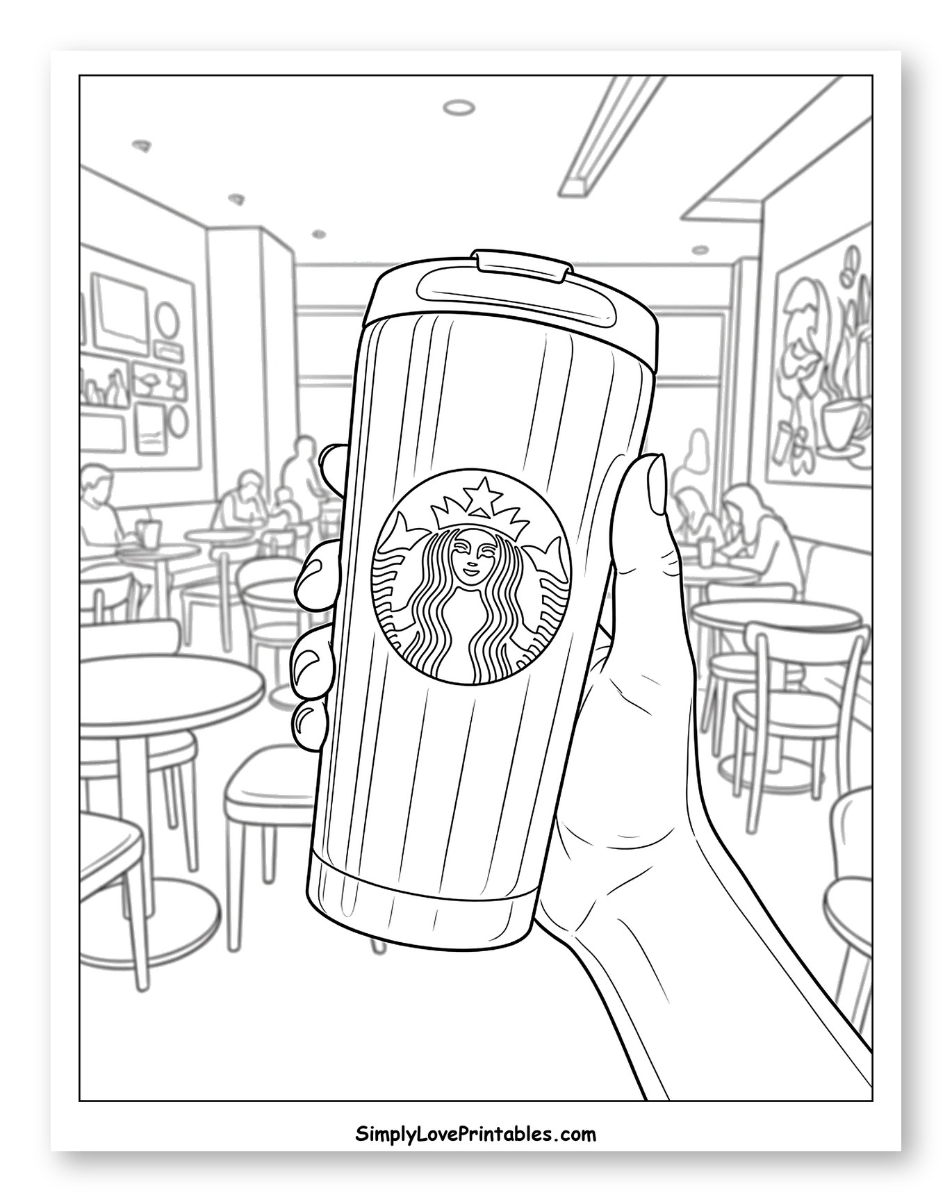 Hand Holding Starbucks Tumbler in a Cafe