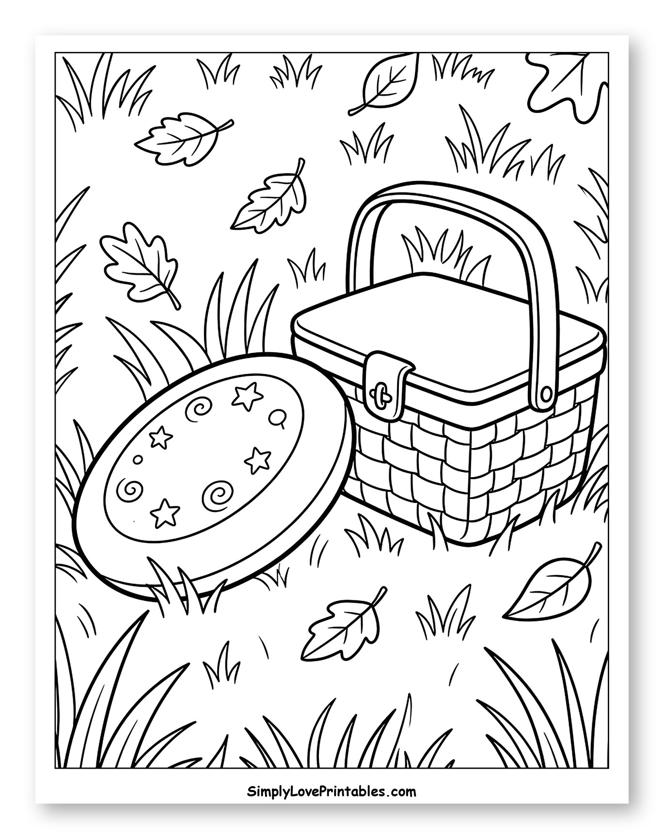 Picnic Basket and Frisbee in Grass with Leaves